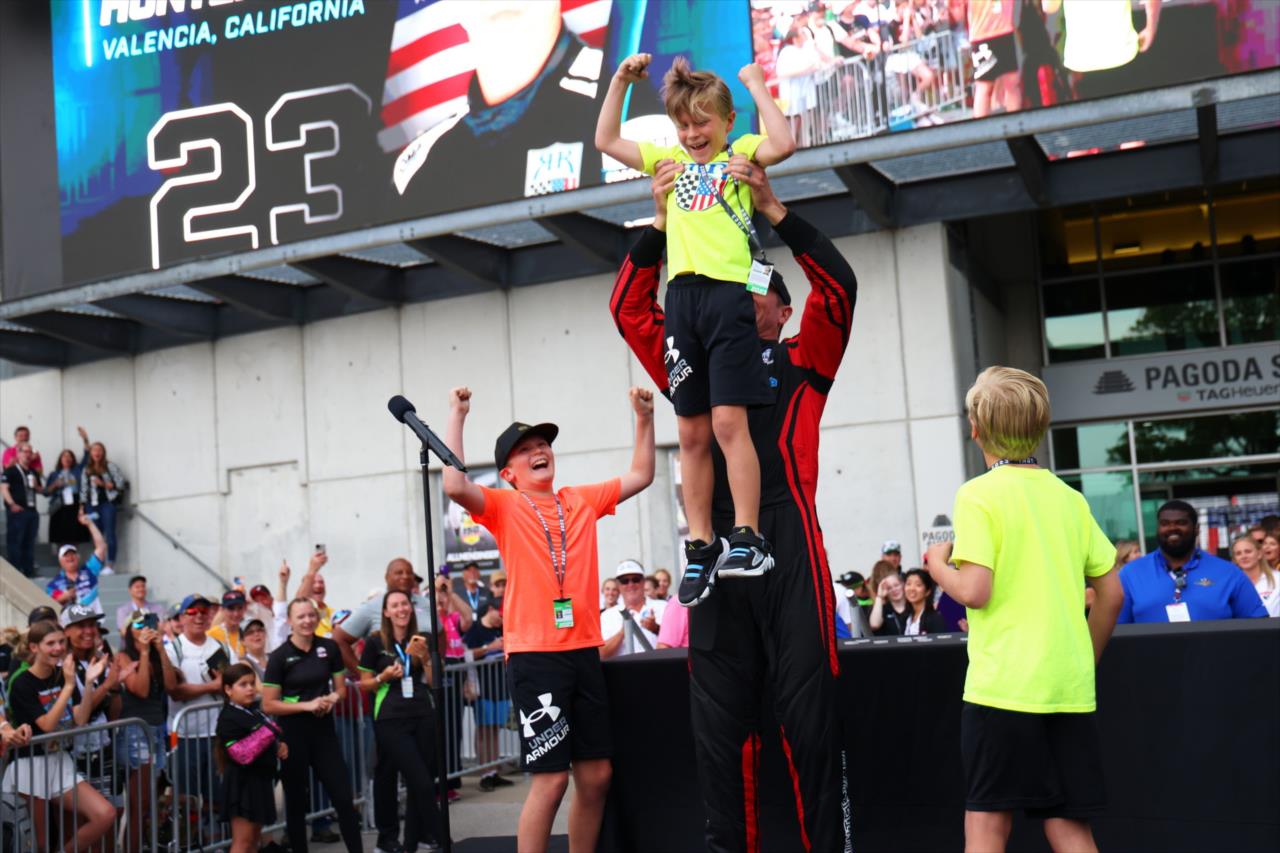 Ryan Hunter-Reay and his sons celebrate drawing the #1 qualification slot - Indianapolis 500 Practice - By: Tim Holle -- Photo by: Tim Holle